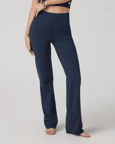 Navy blue Vuori - AllTheFeels Straight Leg pants worn by a person on a light gray background