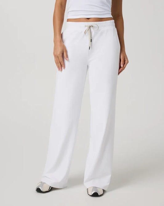 Vuori - Halo Essential Widelegs worn by a person on a plain background