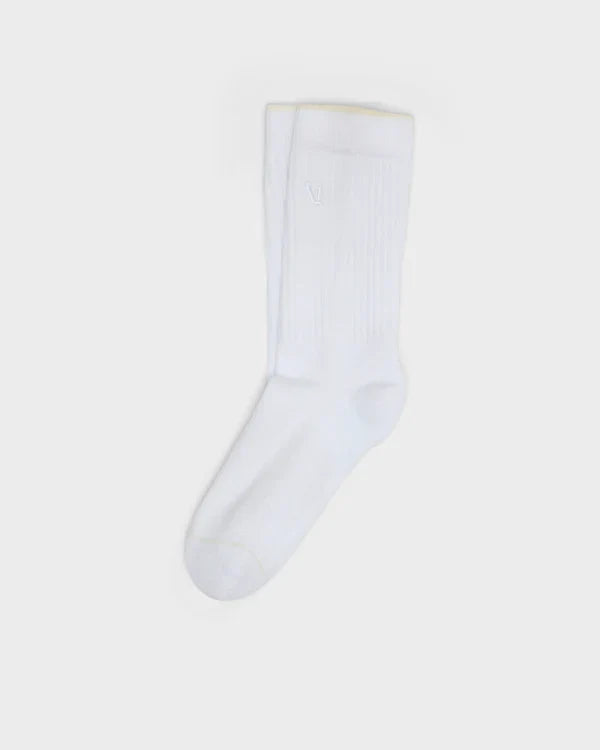 White Vuori V1 Crew Sock on a light gray background