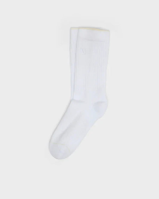 White Vuori V1 Crew Sock on a light gray background