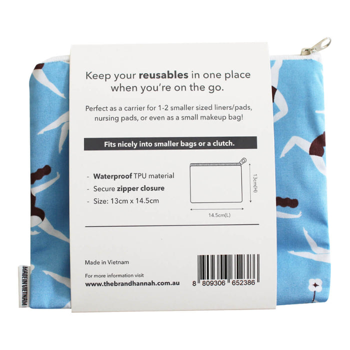 Back view of hannah Waterproof Mini Wet Bag, ideal for carrying 1-2 smaller liners or pads. Approx. 13cm x 14.5cm. Features a waterproof lining with a zipper closure, making it the perfect travel size. Light blue coloured bag. The back shows the label with product features and dimensions.