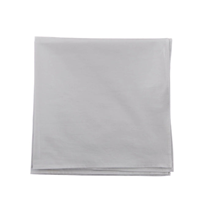 A Wellington High-Shine Cotton Chamois napkin on a grey background,
from KirbyAllison.com.