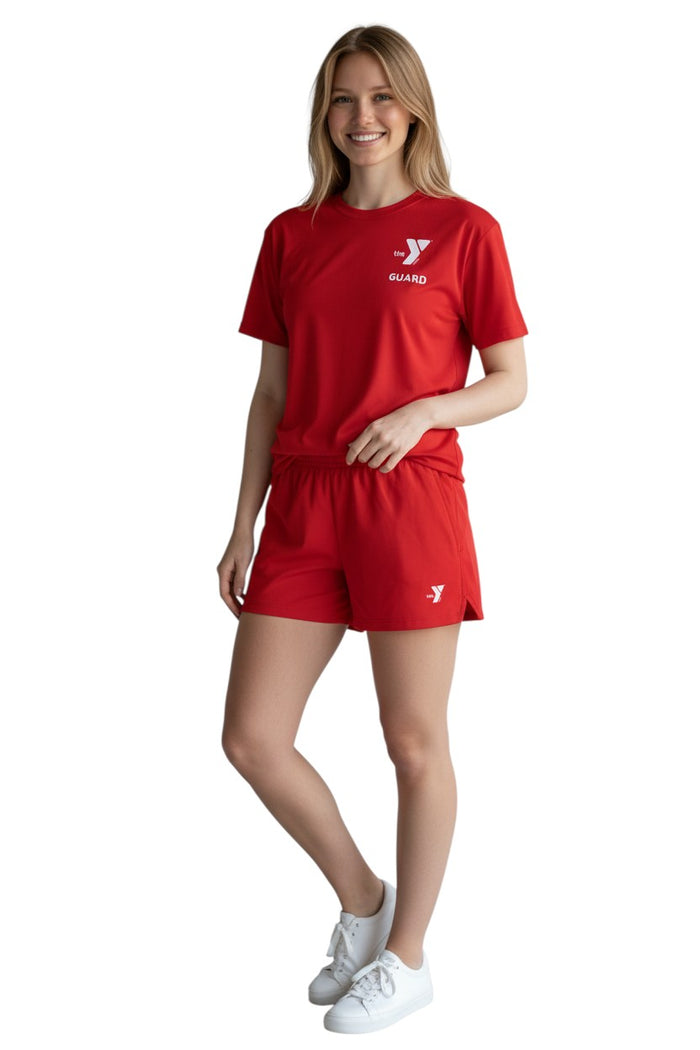 The Lifeguard Store red polyester Dri-Fit tee with white YMCA Guard logo on chest. Short sleeves, crew neck.