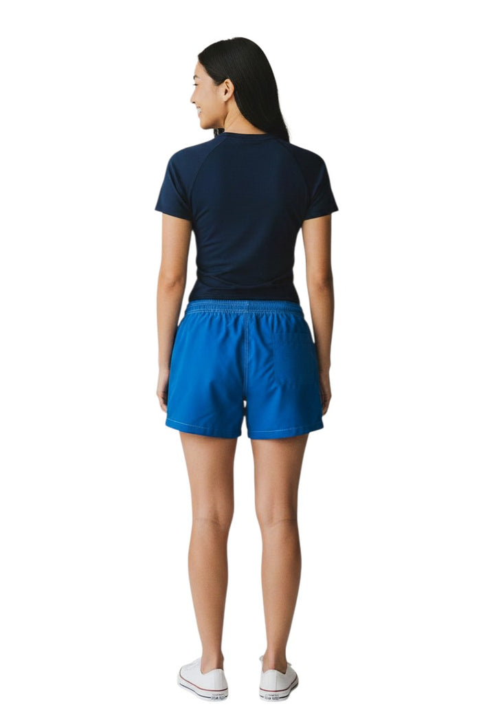 The Lifeguard Store blue polyester-spandex board shorts with YMCA Instructor logo on back pocket. 3" inseam.