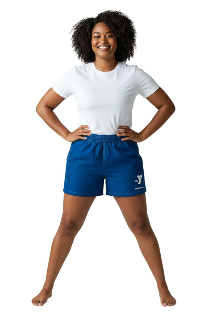 The Lifeguard Store blue polyester-spandex board shorts with elastic waistband, drawstring, and YMCA Instructor logo. Features a side pocket.